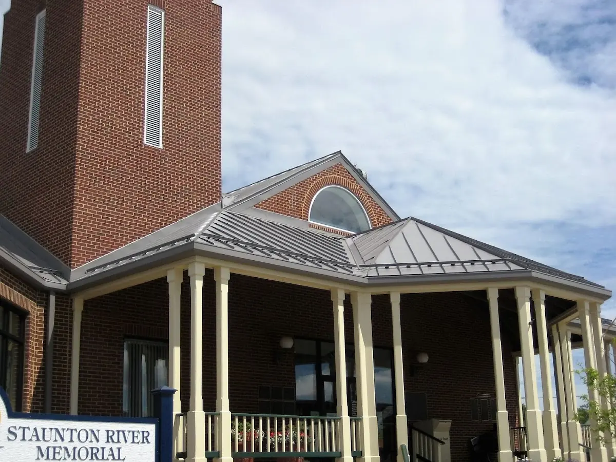 Skilled roofing craftsmen working on a residential roof in Williamsport